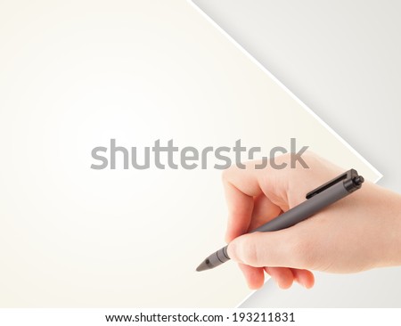 A person writing on a plain white blank paper with a balpoint pen