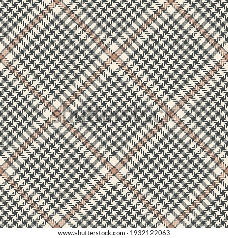 Abstract pattern tweed in grey and beige for textile print. Seamless herringbone textured glen check plaid background for jacket, coat, skirt, other spring summer autumn fashion fabric design.