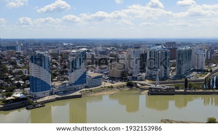 Krasnodar, Russia. New residential buildings on the Kubanskaya embankment. The Kuban River. Flight over the city in summer, Aerial View  