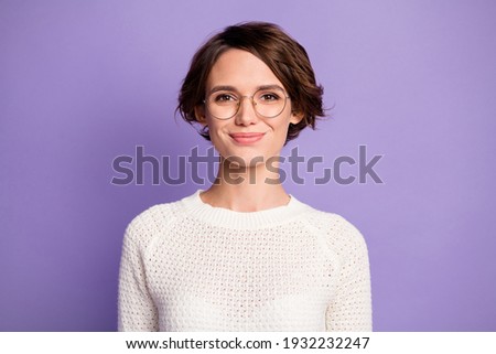 Photo portrait of pretty smart female student wearing round glasses isolated on pastel purple color background