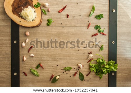 Spices and food ingredients to make delicious spaghetti Royalty-Free Stock Photo #1932237041