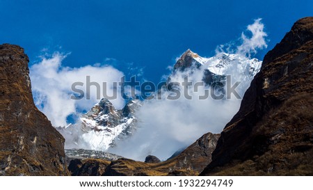 Cloudy view of Machapuchare moutain from Annapurna Base Camp in Nepal