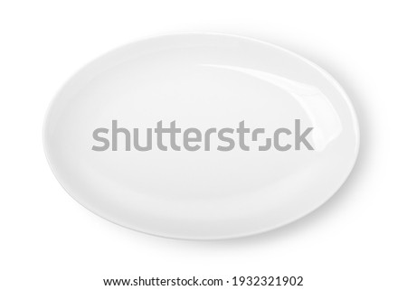Oval white plate isolated on a white background Royalty-Free Stock Photo #1932321902