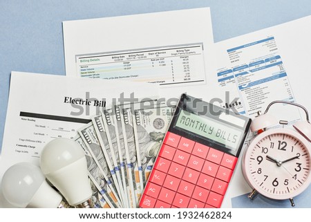 Monthly utility bills. Cost of Utilities. Planning for utility costs in the monthly budget. Electricity bills by state monthly report. Budget for highly-variable utility bills Royalty-Free Stock Photo #1932462824