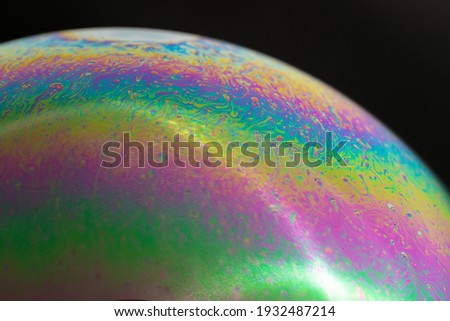 Abstract background soft focus psychedelic of soap bubble colorful texture is Macro Photography create breathtaking bubble photos.