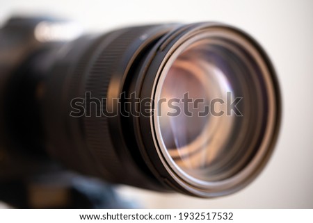 Close up lens of a professional lens for a digital camera. The concept of professional equipment for working with photo and video.