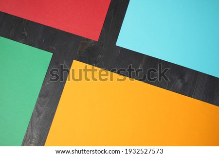 Blue, green, yellow and red color backgrounds with black border