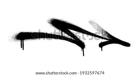 Graffiti arrow with overspray in black over white. Royalty-Free Stock Photo #1932597674