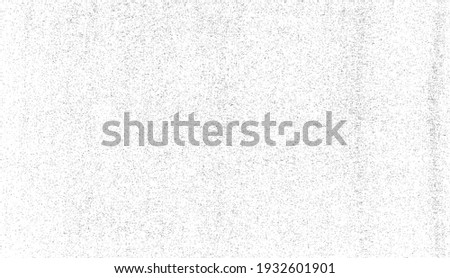 Abstract vector noise. Small particles of debris and dust. Distressed uneven background. Grunge texture overlay with rough and fine grains isolated on white background. Vector illustration. EPS10. Royalty-Free Stock Photo #1932601901