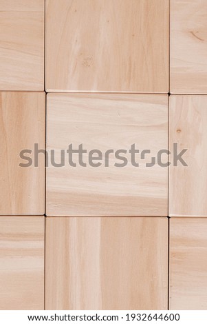 Texture of wooden cubes from natural wood as a background. Copy, empty space for text.