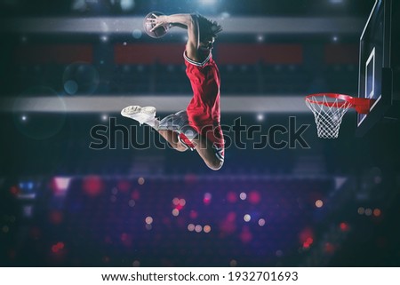 Basketball game with a high jump player to make a slam dunk to the basket