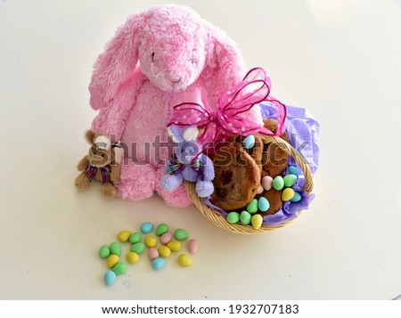 Easter Bunny treats and baskets for holiday Easter Sunday gifts for children, chocolate and stuffed toys. Photo concept, holiday, seasonal