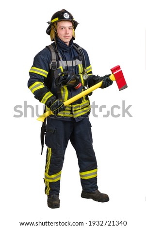 Full body young brave man in uniform and hard hat of fireman holds axe and looking at camera with smile isolated on white background