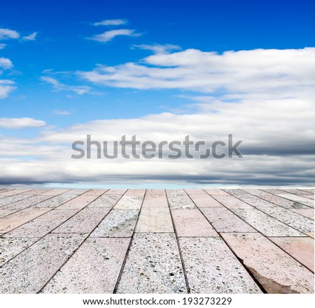 decorative paving stone on a background of blue sky