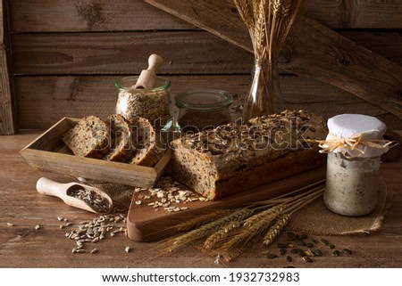 Sourdough grain bread on a rustic background