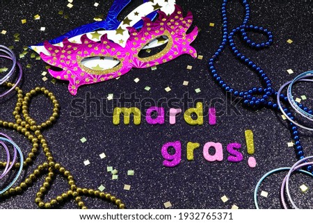Mardi Gras Party Masks With Jewelry And Confetti