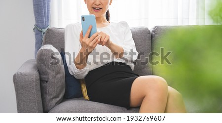 Portrait of a Japanese woman with a mobile phone