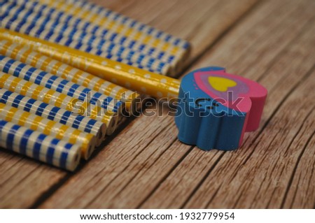 Creative arrangements of pencils and crayons