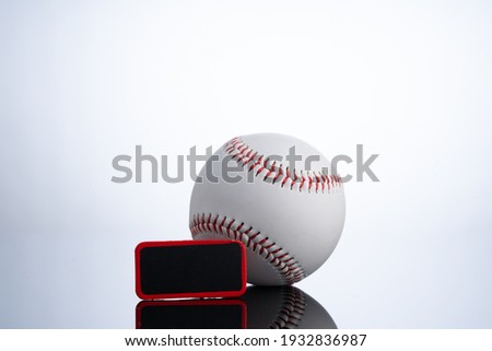 Softball with white background with close up view.