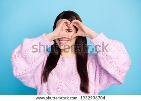 Photo of young cheerful woman happy positive smile show finger heart sign feelings love romantic isolated over blue color background Royalty-Free Stock Photo #1932936704