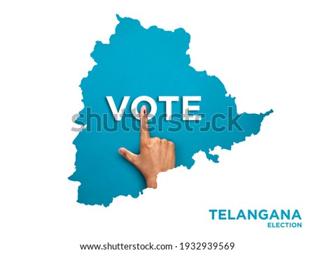 VOTE FOR INDIA TELANGANA , male Indian Voter Hand with voting sign or ink pointing out , Voting sign on finger tip Indian Voting on blue background Royalty-Free Stock Photo #1932939569