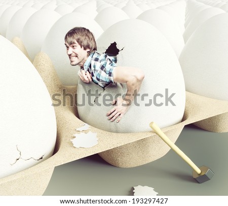 Man hit shell, getting out of eggs. Creative concept Royalty-Free Stock Photo #193297427