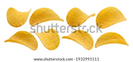 A set of potato chips. Isolated on a white background Royalty-Free Stock Photo #1932991511