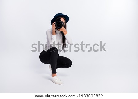 Full length photo of charming attractive young woman take picture shooting wear hat isolate on grey color background