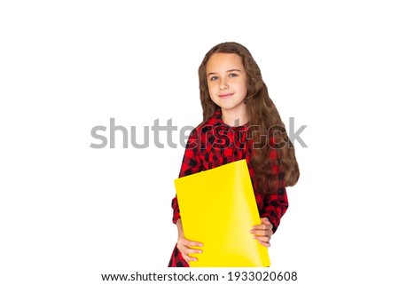 school girl with blue folder.  Folder with a picture of a happy child. child development. smart child model holding a school folder. take notes. girl is ready to go. writing and reading information. 