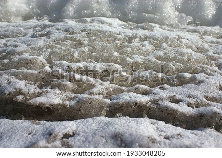 layered structure of a melting snowdrift in spring