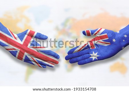 Australia and UK - Flag handshake symbolizing partnership and cooperation with the United Kingdom Royalty-Free Stock Photo #1933154708