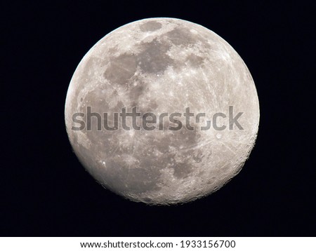 nightly sky with large full moon Royalty-Free Stock Photo #1933156700