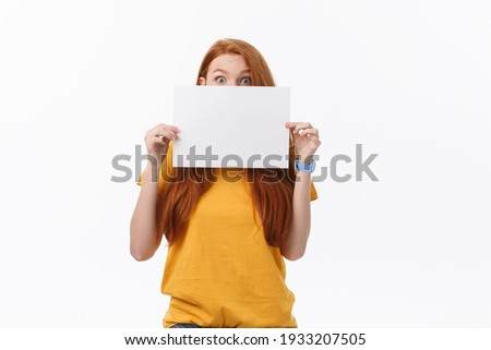 Young casual woman style isolated over white background hold sign card