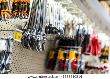 Tools put up for sale in a hardware store  Royalty-Free Stock Photo #1933210814