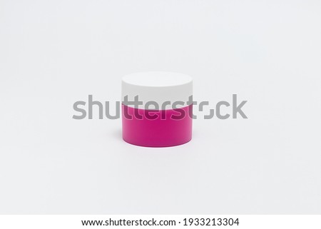 Pink white jar for cosmetic cream. Isolated jar for Beauty industry on white background. 
