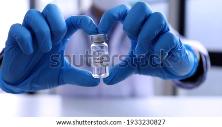 Doctor or scientist in laboratory holding covid-19 vaccine, Coronavirus disease vaccine research and development concept