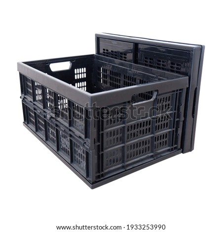 Foldable and stackable storage box Royalty-Free Stock Photo #1933253990