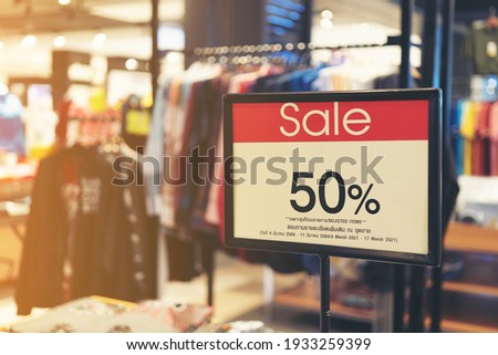 Product discount sale 50% labels on the shelves in the mall,sale label.