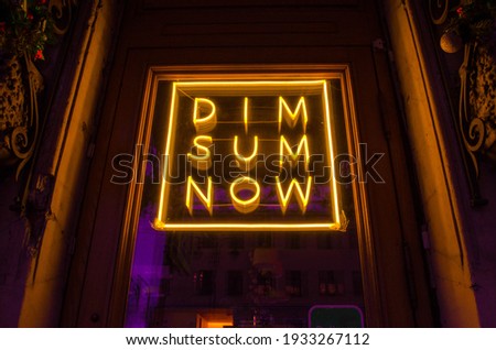 
Neon lettering shot at night