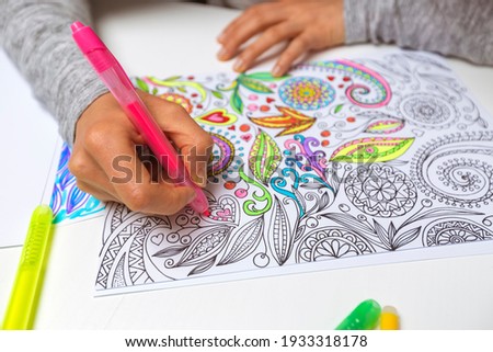 Coloring book for adults. Drawing as a hobby. Concentration activities to relieve stress. 