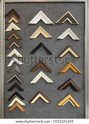 Set of wooden frames for printing, mirrors or photo isolated on grey frame background
