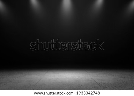Product showcase with spotlight. Black studio room background. Use as montage for product display Royalty-Free Stock Photo #1933342748