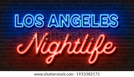 Neon sign on a brick wall - Los Angeles Nightlife