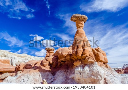 Toadstool hoodoos balanced rock formation of Vermilion Cliffs near Coyote Buttes North, Paria, BLM, Kanab, Utah, USA Royalty-Free Stock Photo #1933404101