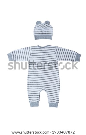 Children's knitted overalls with a hat for a toddler isolated on a white background