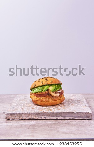 vegan burger on top of a gray slab
