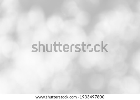 Abstract blur white and silver background with soft shimmer for display, promotion and advertisement of products and content in Christmas and Happy New Year collection concept.