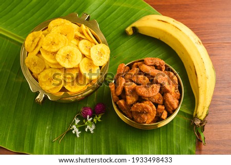 Kerala banana chips for Onam festival popular deep fried snack traditional South Indian tea time snack on banana leaf, Kerala India. fried in coconut oil on Onam, Vishu, Diwali Deepawali, Ramzan, Eid.