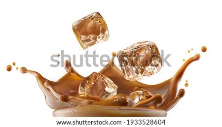 Milk coffee splashed from the mouth of the glass Royalty-Free Stock Photo #1933528604