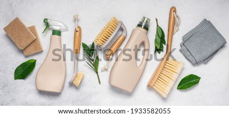 Eco brushes, sponges and rag on white background. Flat lay eco cleaning products. Cleaner concept  Royalty-Free Stock Photo #1933582055